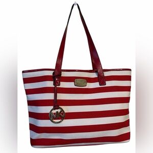 Michael Kors Jet Set Travel or Fulton tote bag in red and white striped canvas